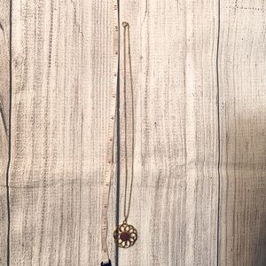 Gold Necklace with Flower Pendant and Brown Stone